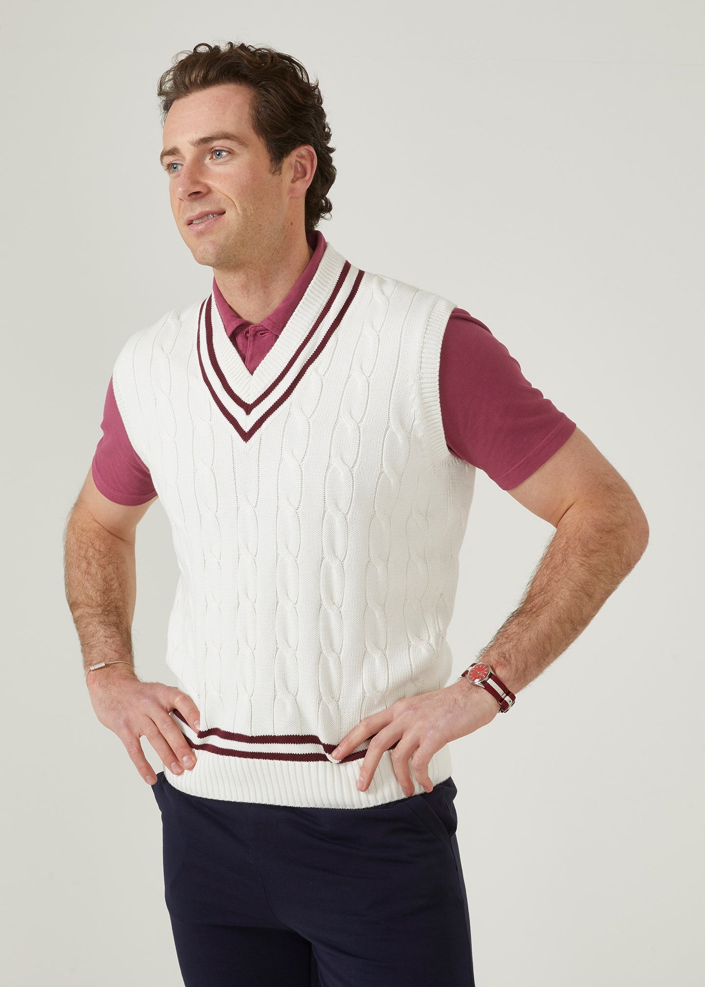 Ecru men's cable knit slipover in ecru with a claret trim.