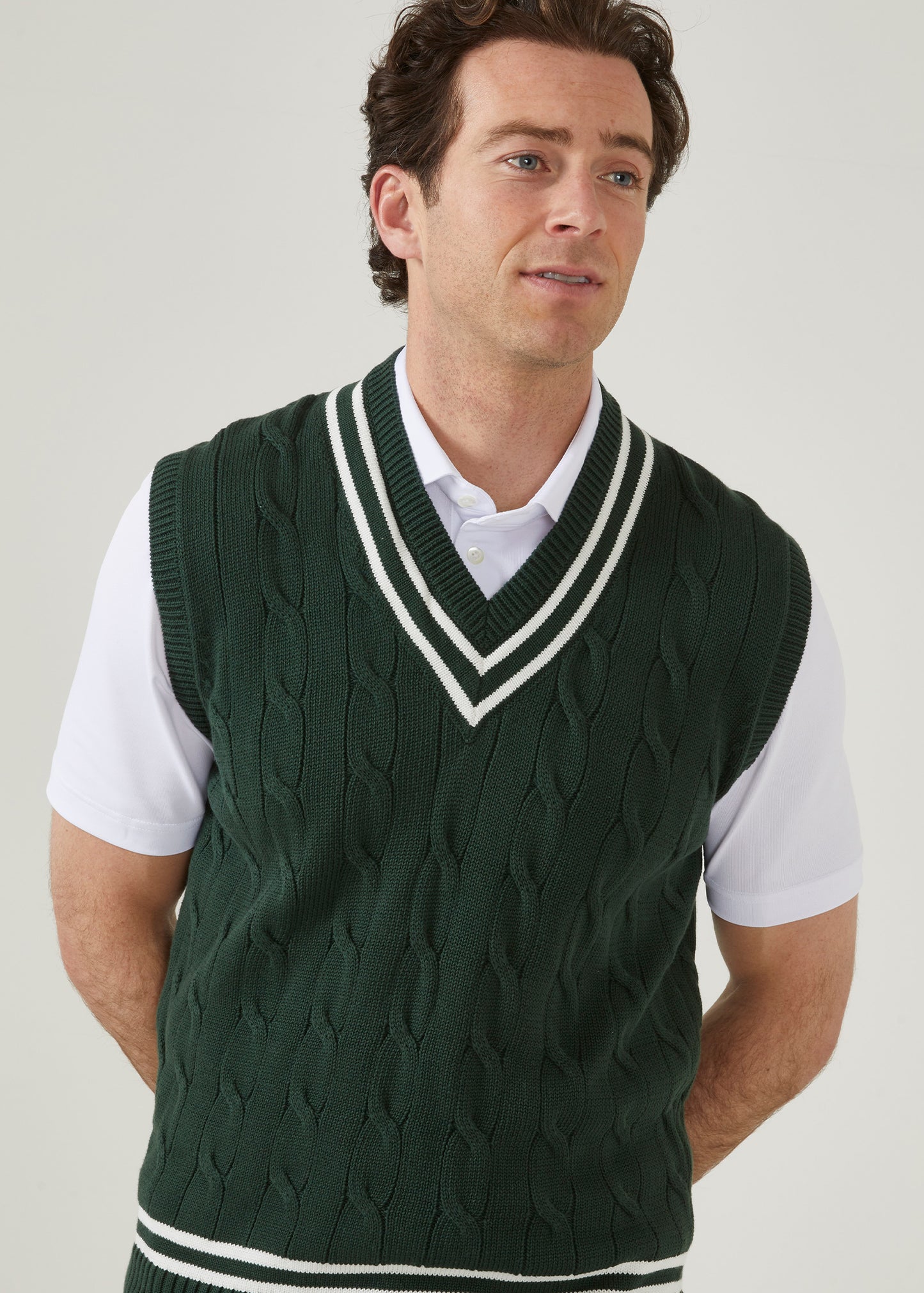 Men's slipover in cable design with a racing green colourway.
