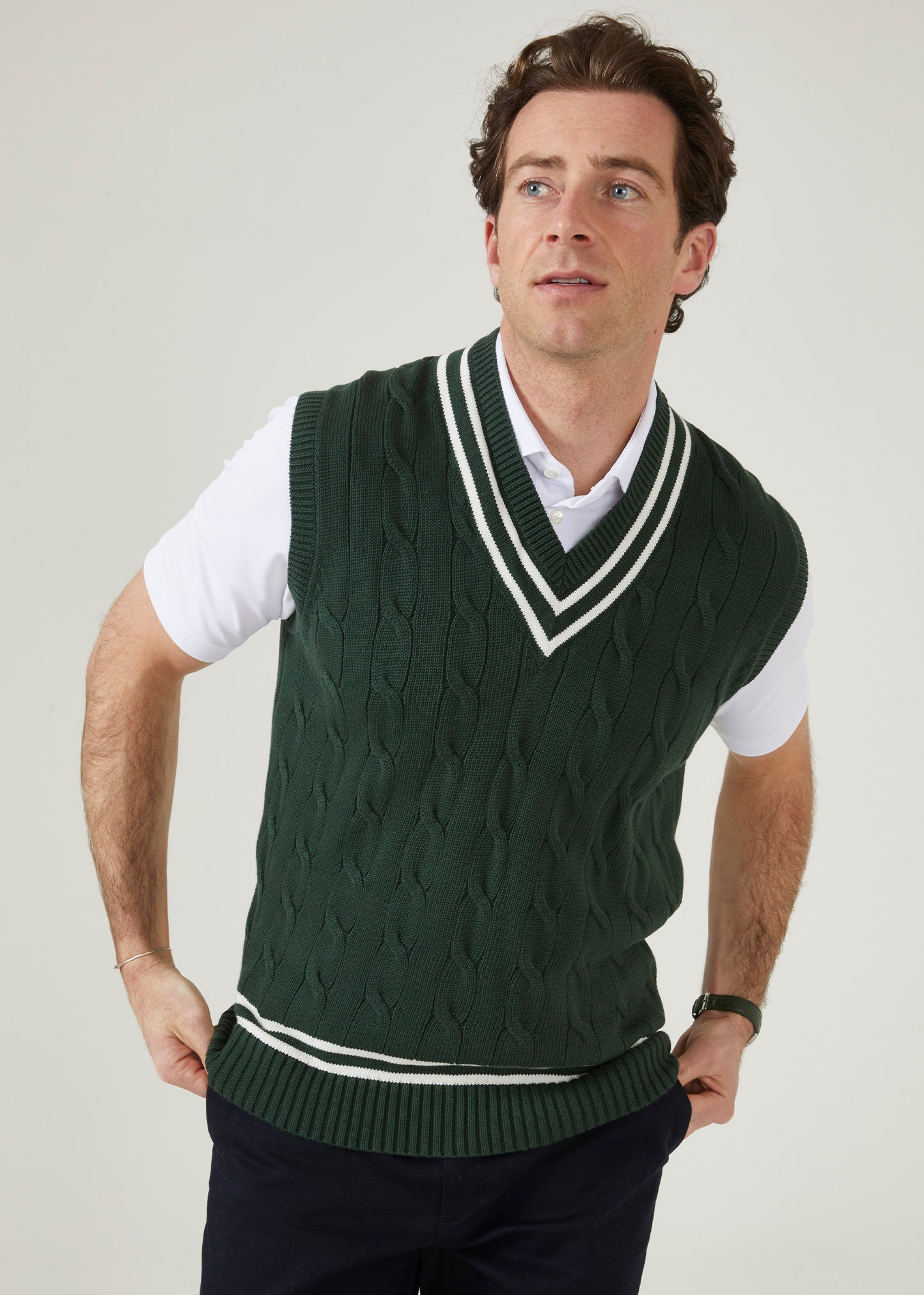 Men's slipover in cable design with a racing green colourway.