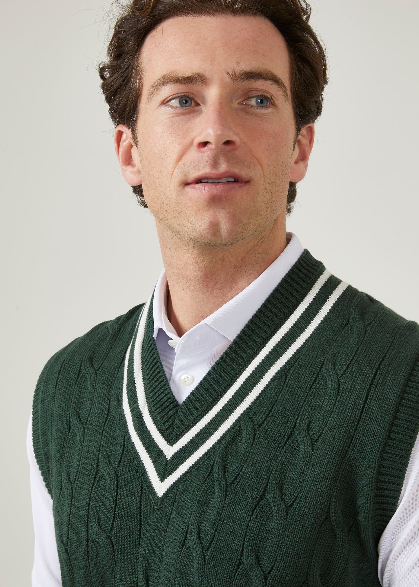 Men's slipover in cable design with a racing green colourway.