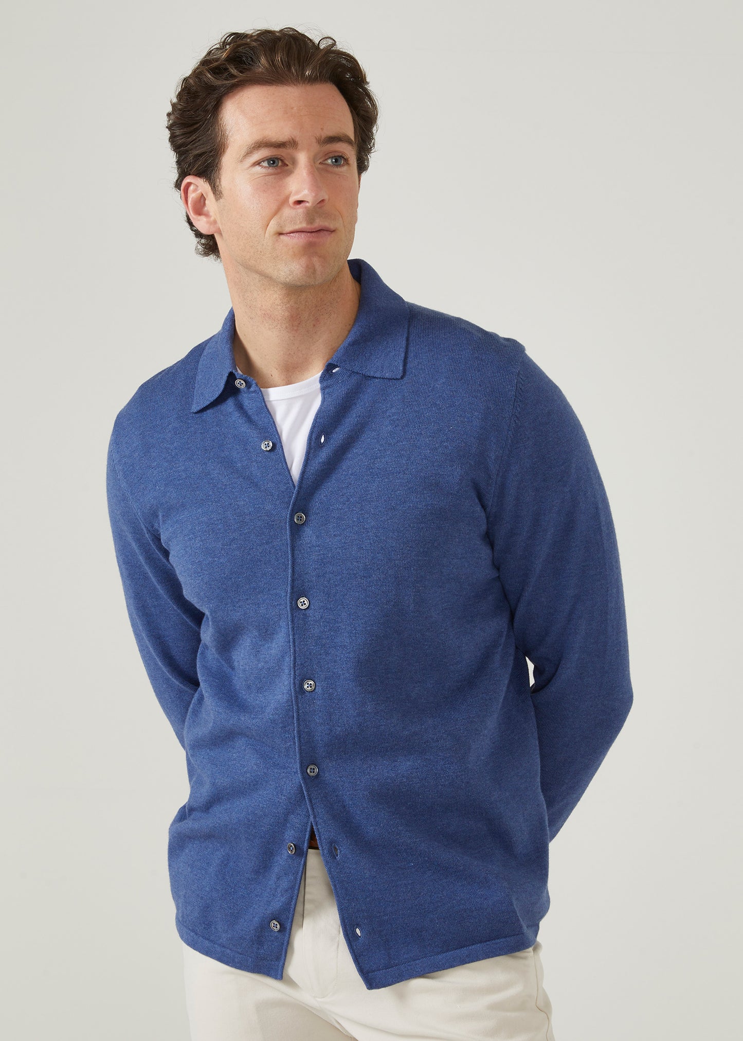 Long sleeve buttoned front shirt made with cotton cashmere in indigo blue.