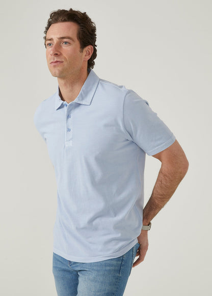 Light blue short sleeve polo shirt made from peruvian cotton.