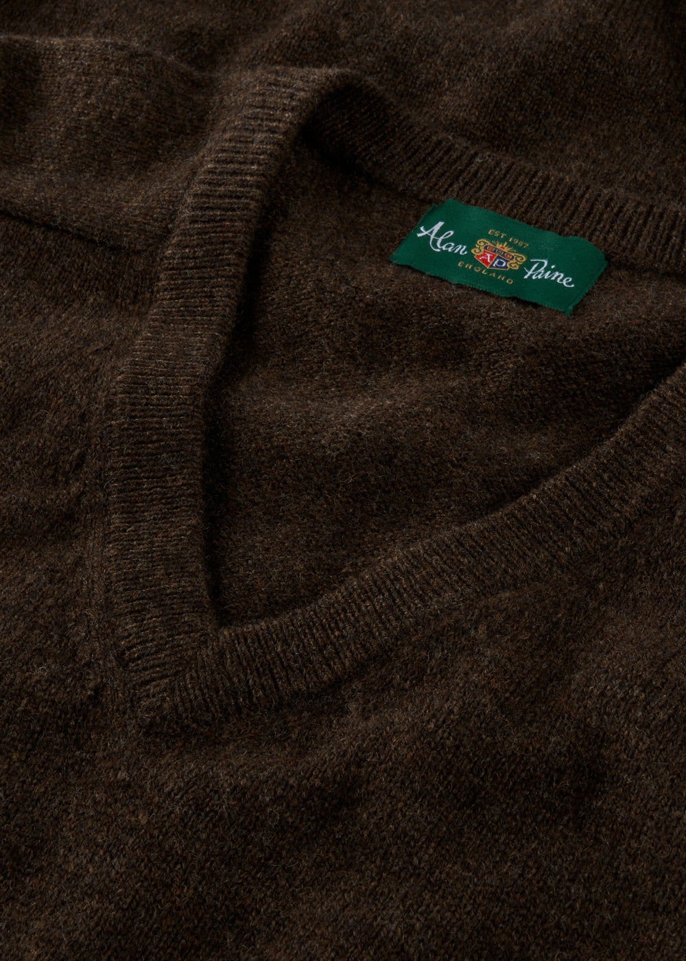 Kilsyth Lambswool Vee Neck Jumper in Cocoa with green Alan Paine collar label; classic regular fit style.
