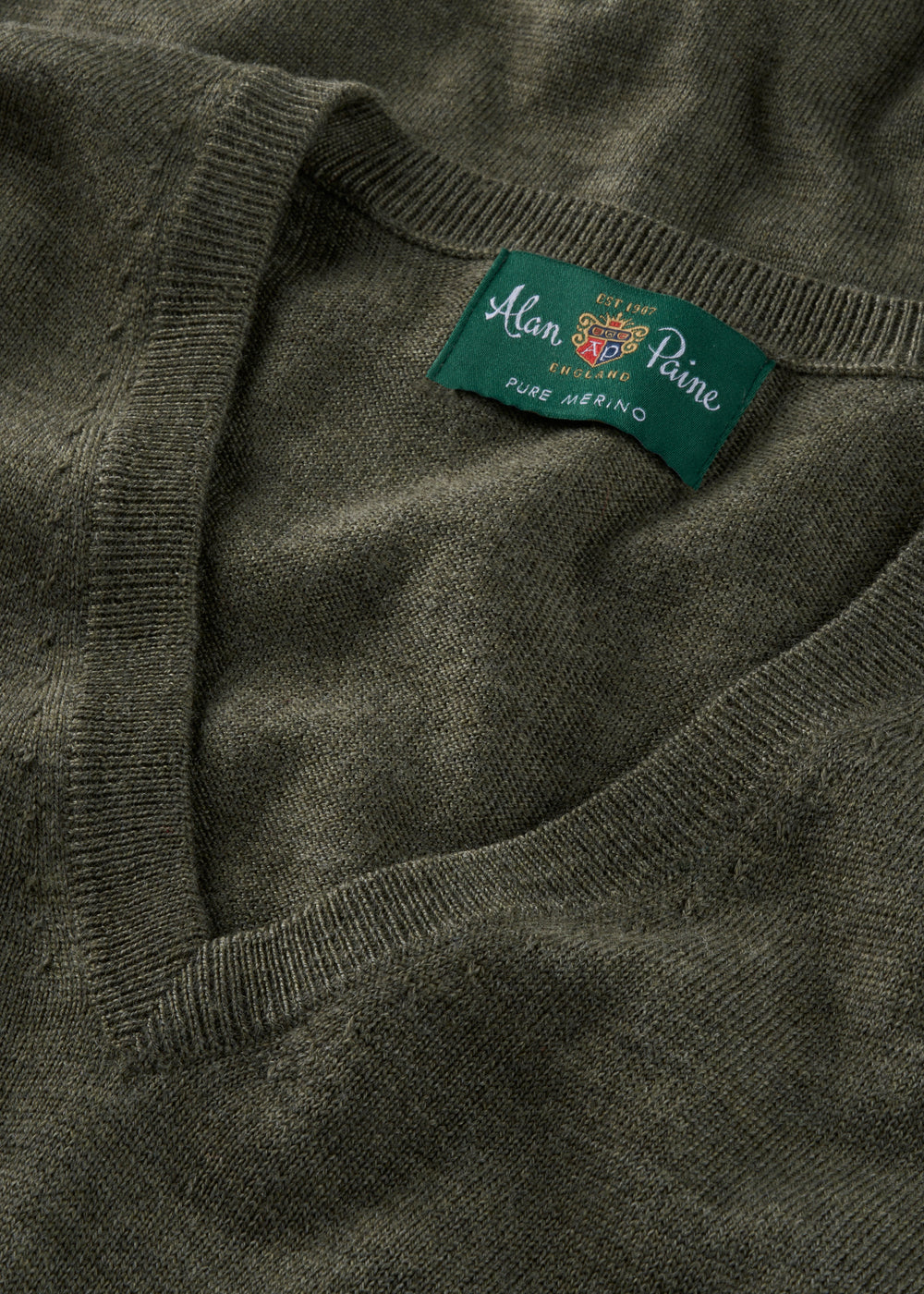 Dark green vee neck jumper