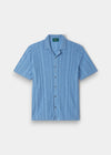 Alan Paine Abbotsbury short sleeve shirt in Carolina blue with a ribbed texture and open collar design.
