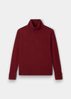 Alexa Ladies Wool and Cashmere Roll Neck in Berry, with long sleeves, folded cuffs, and ribbed hem on light background.