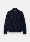 Alan Paine dark navy Geelong wool knitted shirt with button-through front, chest pockets, and a soft collar.