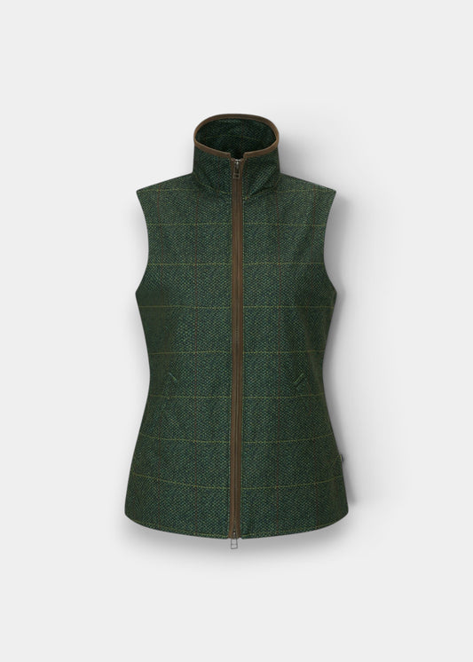Alan Paine Didsmere ladies technical gilet in myrtle green with a tweed effect, faux leather trim, and zip closure.