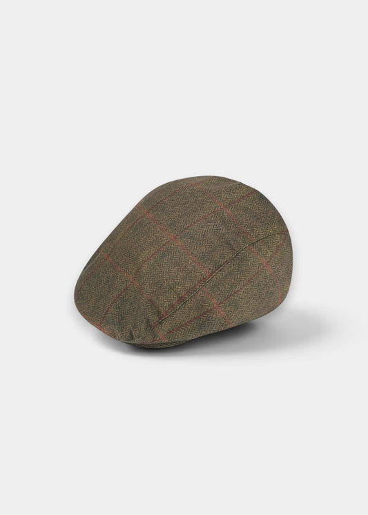 Alan Paine Didsmere waterproof cap in oak brown with a classic tweed effect check pattern and elasticated fit.