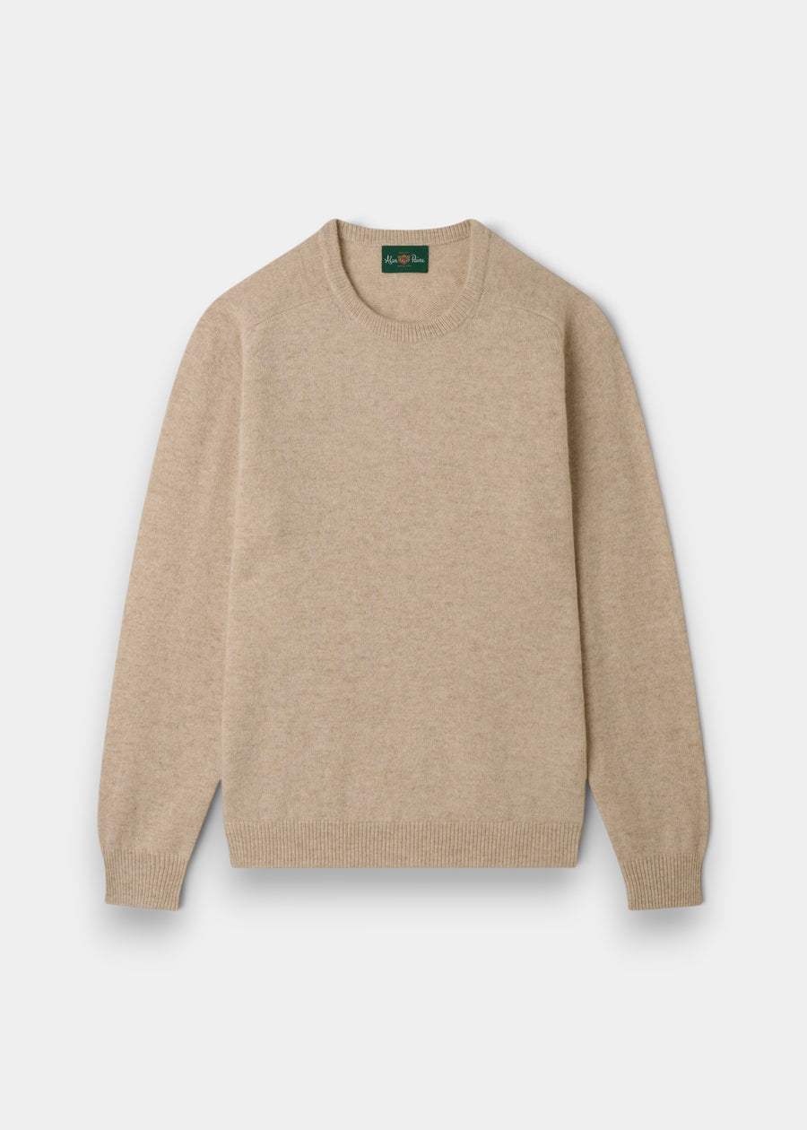 Lenzie Lambswool Crew Neck Jumper in Linen, regular fit, shown laid flat with ribbed cuffs and collar.