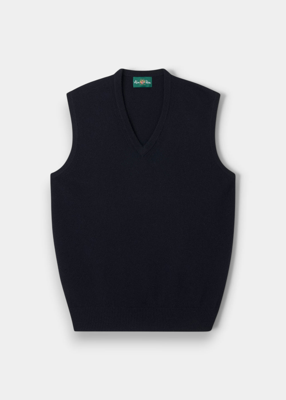 Alan Paine navy lambswool slipover with a classic fit, v-neck, and ribbed hem, perfect for layering.