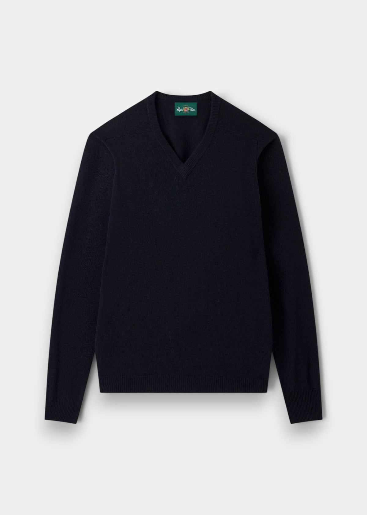 Alan Paine navy V-neck jumper in soft lambswool with a classic fit, saddle shoulders, and ribbed cuffs and hem.
