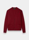 Alan Paine Cornwall lambswool cardigan in poppy melange with a v-neck, five buttons, and two jetted pockets.