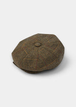 Alan Paine Combrook men's bakerboy cap in teak wool tweed with a subtle herringbone and check pattern.