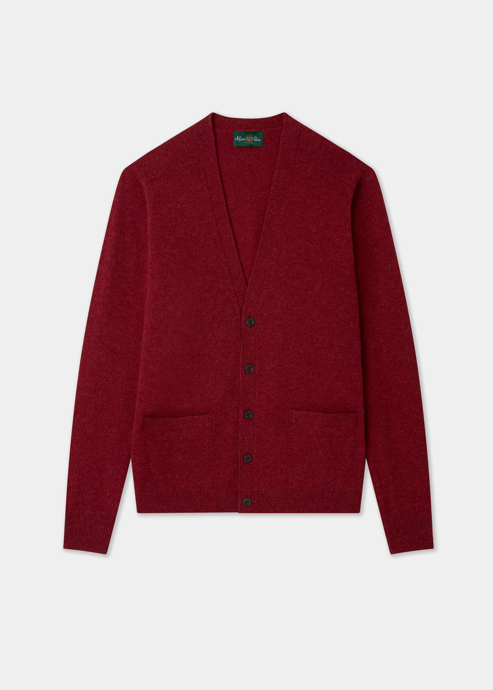 Poppy red cardigan on a light gray background