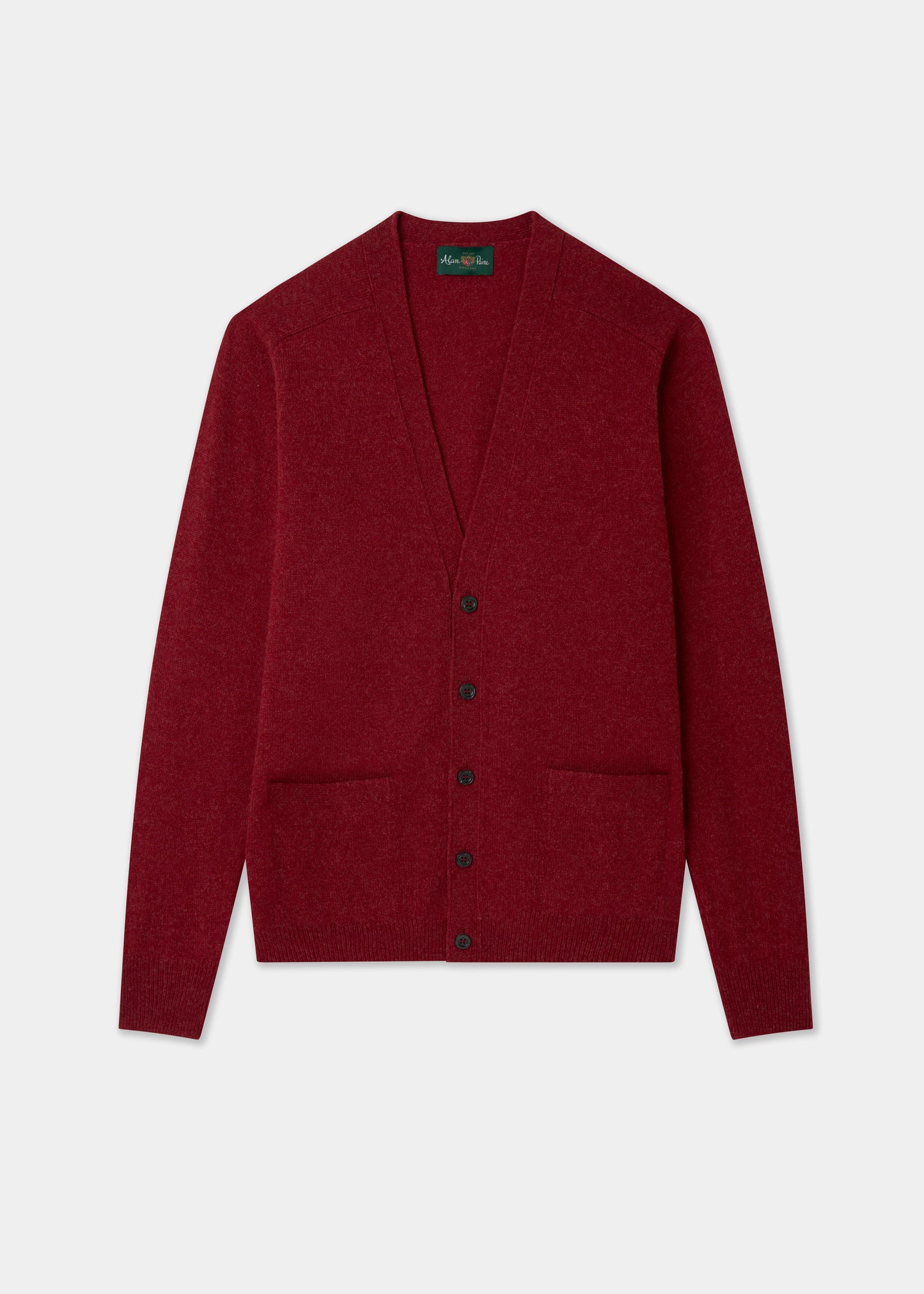 Poppy red cardigan on a light gray background