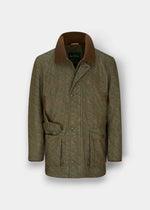 Didsmere Men’s Technical Tweed Coat in Firth: green tweed, brown collar, waterproof, buttons, large pockets.