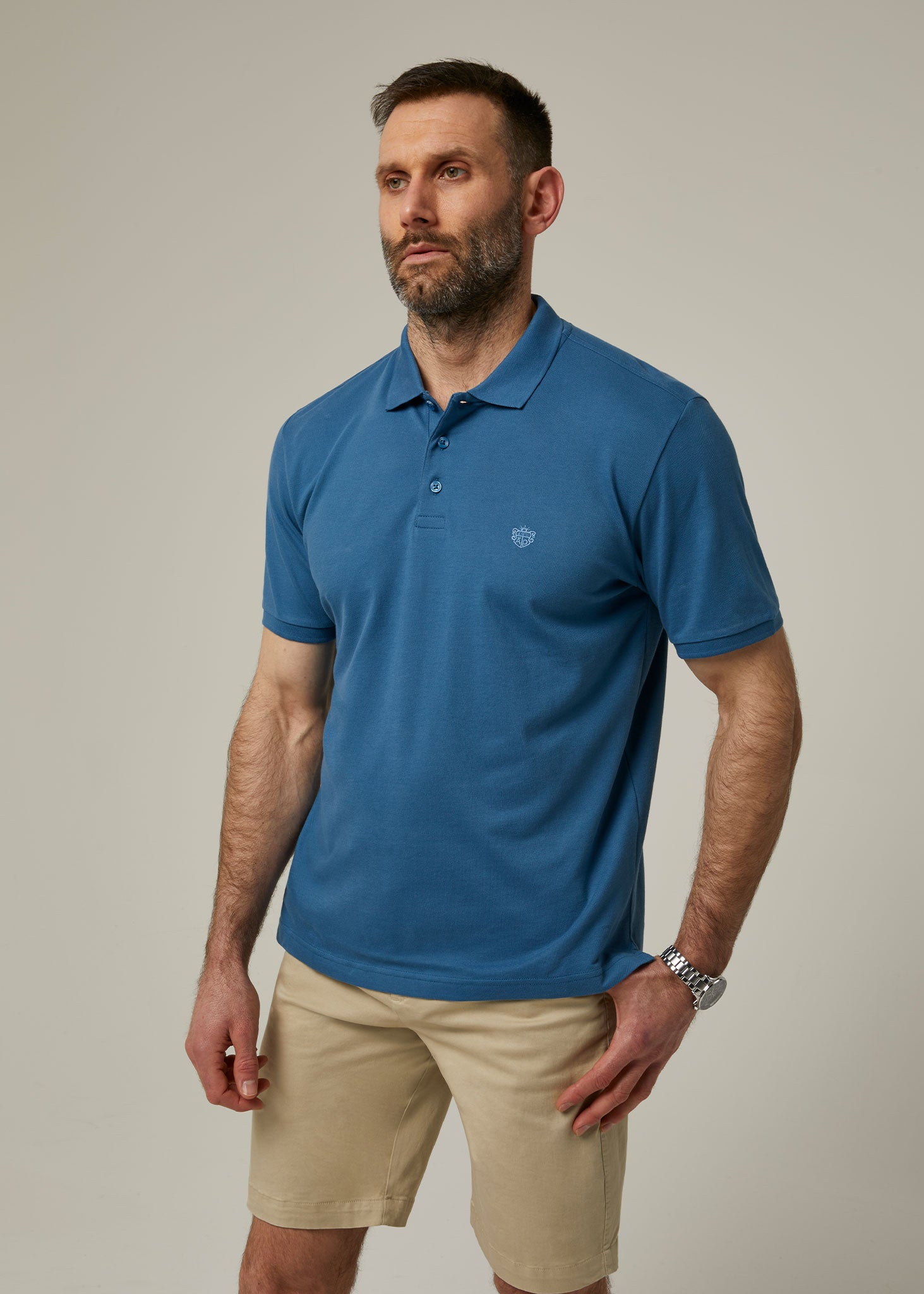 Alan Paine men's short sleeved polo shirt in mid-blue