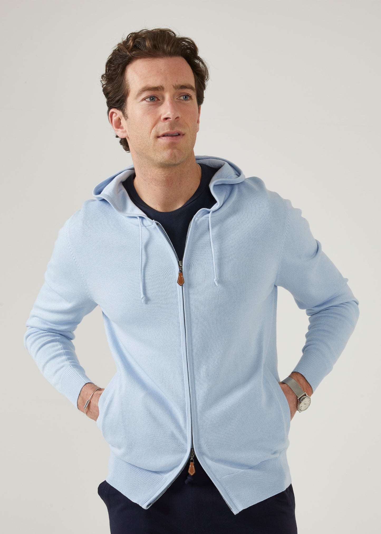 Cotton hoodie in bluebell with a front zip and side pockets.