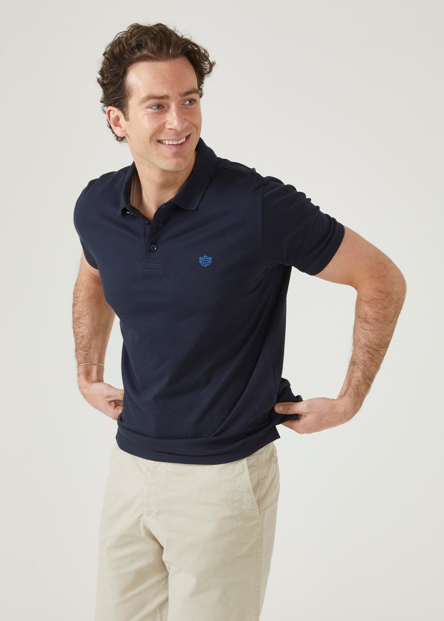 Pima cotton polo shirt in navy with AP emblem.