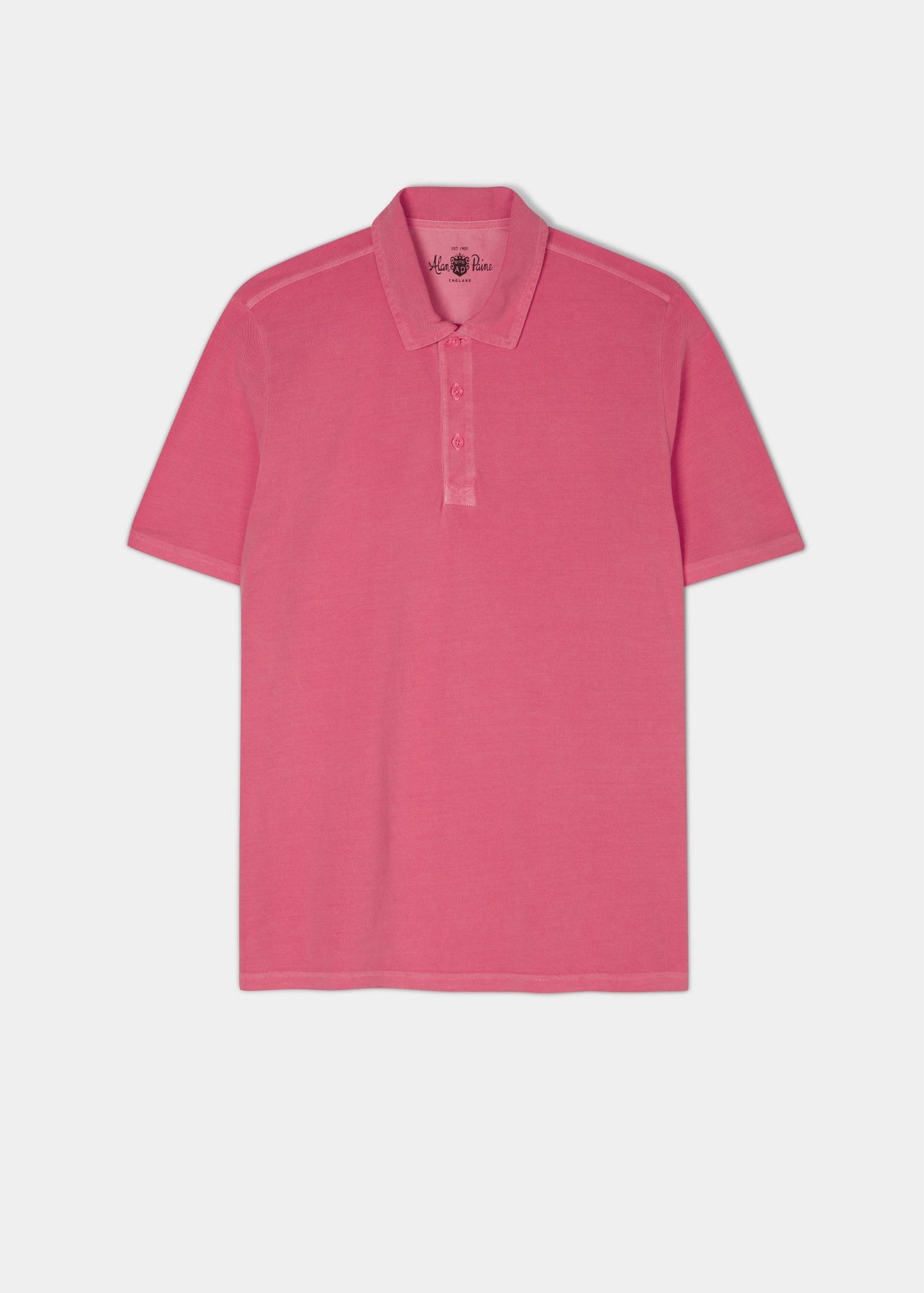 calypso pink polo shirt with short sleeves made from 100% preuvian cotton.