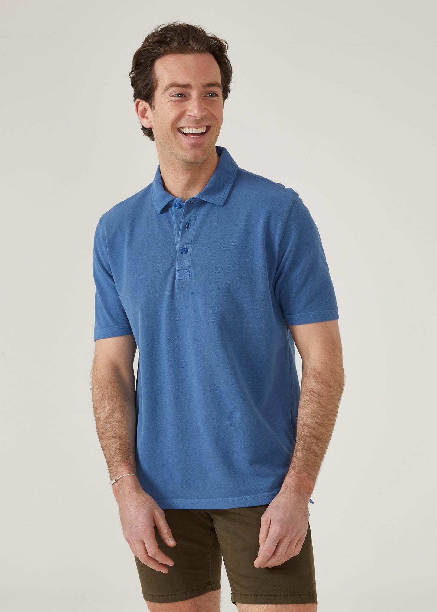 peruvian cotton short sleeve polo shirt in regatta blue.